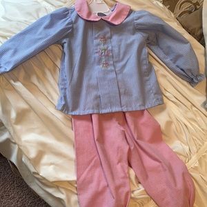 So adorable! Gingham pink and blue top and bottom set with teacup embroidery!